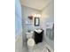 Charming half bathroom with stylish vanity, modern fixtures, and elegant decor at 1210 W Grant St, Thorntown, IN 46071