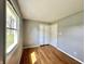 Comfortable bedroom with hardwood floors, large windows, and a spacious closet at 1210 W Grant St, Thorntown, IN 46071