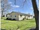 Well-kept single-level home showcasing a neatly landscaped yard and a classic, understated design at 1210 W Grant St, Thorntown, IN 46071