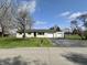 Well-maintained one-story home with an attached and detached garage, set on a spacious lot with mature trees at 1210 W Grant St, Thorntown, IN 46071