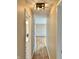 Hallway with hardwood floors leading to rooms at 1210 W Grant St, Thorntown, IN 46071