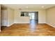 Inviting living room features pristine hardwood floors and an open kitchen view at 1210 W Grant St, Thorntown, IN 46071