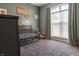 Bright Bedroom with a crib, dresser, and plenty of natural light at 122 Stamford Dr, Pittsboro, IN 46167