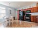 Eat-in kitchen featuring stainless steel appliances, tile flooring, and an eat-in table at 122 Stamford Dr, Pittsboro, IN 46167