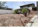The backyard features a privacy fence, burn barrel, and a pergola-covered patio, creating an outdoor oasis at 1229 Dallas Dr, Plainfield, IN 46168