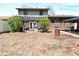 Spacious backyard featuring a pergola-covered patio for outdoor dining and enjoyment, a garage, and fenced yard at 1229 Dallas Dr, Plainfield, IN 46168