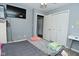 This bedroom features a flatscreen tv and a closet with double doors at 1229 Dallas Dr, Plainfield, IN 46168
