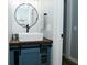 Stylish powder room featuring a modern vessel sink and chic fixtures at 1229 Dallas Dr, Plainfield, IN 46168