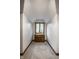Quiet attic space with a custom desk and cabinet, natural light, and plush carpets at 12613 Carrington Pl, Carmel, IN 46033