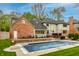 Backyard featuring a private pool, patio area, and lush green lawn at 12613 Carrington Pl, Carmel, IN 46033