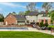 Backyard featuring a private pool, patio area with furniture, and a lush green lawn at 12613 Carrington Pl, Carmel, IN 46033