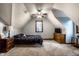 Cozy bedroom with a ceiling fan, a dresser, and natural light from the window at 12613 Carrington Pl, Carmel, IN 46033