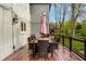 Outdoor deck with table and chairs for outdoor dining, featuring a built-in light fixture, offering a cozy and inviting atmosphere at 12613 Carrington Pl, Carmel, IN 46033