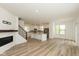 Open concept living room and kitchen features a large island and stainless steel appliances at 13349 Minden Dr, Fishers, IN 46037