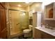 Modern bathroom featuring a glass-enclosed shower, white vanity, and updated fixtures at 1366 Swan Dr, Franklin, IN 46131