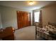 Cozy bedroom featuring a sliding door closet, neutral walls, and a bright window at 1366 Swan Dr, Franklin, IN 46131