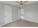 Bedroom with carpet, ceiling fan, and closet space at 1528 E 300 N, Lebanon, IN 46052