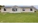 Charming single-story home featuring a tidy front yard with simple landscaping at 1528 E 300 N, Lebanon, IN 46052