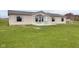 Charming single-story home featuring a tidy front yard with simple landscaping at 1528 E 300 N, Lebanon, IN 46052