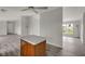 View of the kitchen island with an open layout in this home at 1528 E 300 N, Lebanon, IN 46052