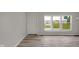 Bright living area with large windows, providing lots of natural light at 1528 E 300 N, Lebanon, IN 46052