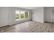 Bright living area with large windows, providing lots of natural light at 1528 E 300 N, Lebanon, IN 46052