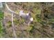 Aerial shot of a secluded property with a pool, surrounded by lush trees, offering privacy and tranquility at 00 Oak Rd, Westfield, IN 46074