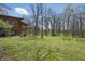 Expansive backyard with lush green grass and mature trees, a beautiful setting for outdoor activities and relaxation at 00 Oak Rd, Westfield, IN 46074
