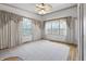 Spacious bedroom featuring hardwood floors, neutral carpet, and natural light from several windows at 00 Oak Rd, Westfield, IN 46074