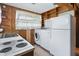 Practical kitchen featuring a stove, sink, refrigerator, and washing machine at 00 Oak Rd, Westfield, IN 46074