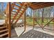 An outdoor seating area includes wood stairs and a metal railing at 00 Oak Rd, Westfield, IN 46074