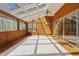 Bright sunroom with a wood paneled walls, and ample natural light at 00 Oak Rd, Westfield, IN 46074
