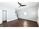 Spacious living room with wood floors, modern paint, new lighting, and easy access to the entry at 1814 New St, Indianapolis, IN 46203