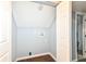 Storage room with wood-look flooring, white trim, and light blue walls at 1814 New St, Indianapolis, IN 46203