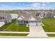 Inviting single-Gathering home with a three-car garage and beautiful landscaping at 19405 Titus Dr, Westfield, IN 46074