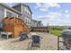 Spacious backyard featuring a deck, hot tub, and seating area with a grill at 19405 Titus Dr, Westfield, IN 46074