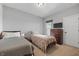 Bedroom featuring two beds, a dresser, and neutral carpet flooring at 19405 Titus Dr, Westfield, IN 46074
