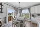 Cozy dining area with stylish decor, access to an outdoor deck, and plenty of natural light for a Gathering gathering at 19405 Titus Dr, Westfield, IN 46074
