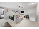 Spacious living room with a ceiling fan, TV, and comfortable seating at 19405 Titus Dr, Westfield, IN 46074