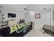 Living room with a ceiling fan, TV, and a comfortable sectional sofa at 19405 Titus Dr, Westfield, IN 46074