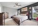 Serene main bedroom with elegant furnishings, stylish decor, and ample natural light for relaxation at 19405 Titus Dr, Westfield, IN 46074