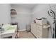 Home office with white cabinets, a printer, and storage shelving at 19405 Titus Dr, Westfield, IN 46074