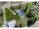 Expansive property featuring a ranch-style house, a swimming pool, a detached garage, and a large lawn at 19702 Tomlinson Rd, Westfield, IN 46074