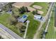 This property features a home with a pool, a detached outbuilding, and plenty of space for parking vehicles at 19702 Tomlinson Rd, Westfield, IN 46074