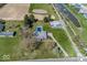Aerial view of a residential home with a swimming pool and large lawn at 19702 Tomlinson Rd, Westfield, IN 46074