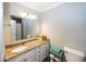 Well-lit bathroom with granite countertops and ample storage space at 19702 Tomlinson Rd, Westfield, IN 46074