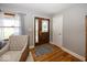 Welcoming foyer featuring hardwood floors and a stained-glass front door at 19702 Tomlinson Rd, Westfield, IN 46074