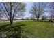 Large lot with well-manicured lawn and mature trees at 19702 Tomlinson Rd, Westfield, IN 46074