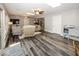Open living room showcasing hardwood floors, modern furnishings, and plenty of natural light at 19702 Tomlinson Rd, Westfield, IN 46074