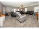 Large living room with plush carpeting and ample seating at 19702 Tomlinson Rd, Westfield, IN 46074